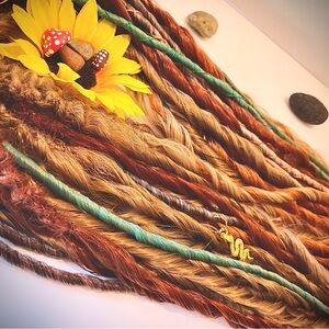 Synthetic Dreadlock extensions Push-up Curlys mixed with twist & seals.